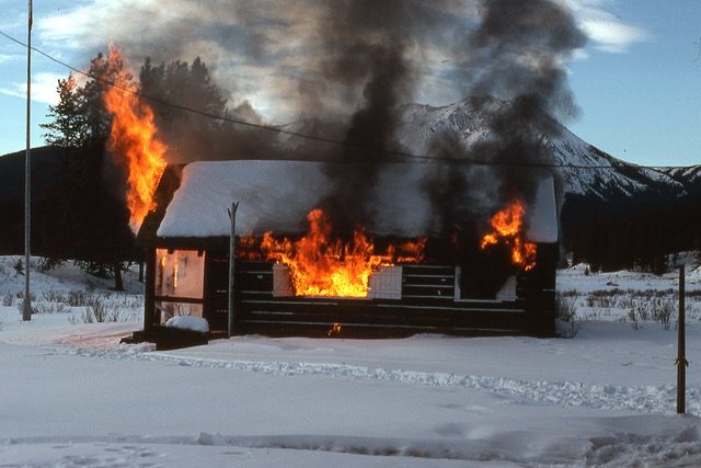 Burning of the old cabin at Willow Creek