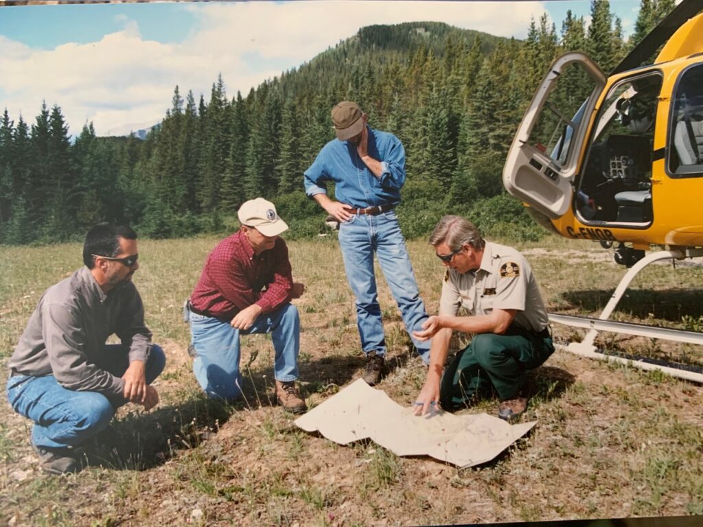 Kevin Van Tighem on the left, Dave Smith on the right, not sure who the other two are.  
Jasper National Park (fire planning) about 2002.
Photo credit:  Kevn Van Tioghem

